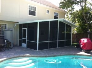 A beautiful screen enclosure attached to the rear of the home in Jacksonville, FL.